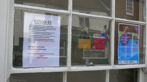 A Veterinary Practice temporarily closed due to Covid 19 Stock Footage 131055197