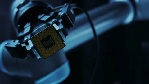 VFX Robot Arm Holding Microchip with Digitalized Effects Stock Footage 140590222