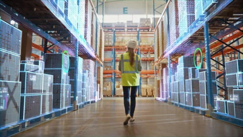 VFX Worker in Digitalized Warehouse Video stock 147173856