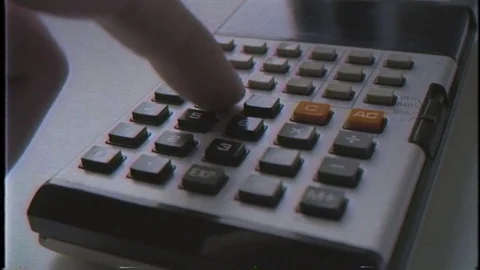 VHS Calculating on Retro Calculator Stockbeeldmateriaal 77099284