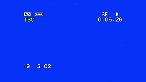 VHS camcorder interface overlay with timecode and date on blue screen 스톡 동영상 332811946