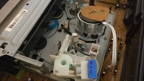 VHS Cassette insert into vcr and play - vcr interior mechanism Stock Footage 105620512