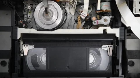 Vhs Cassette Is Played Inside A Vcr Tape Recorder, Top View Video Video stock 305256784