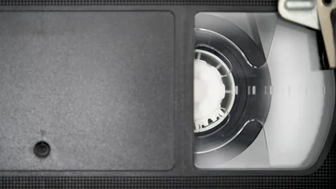 Vhs Cassette Is Played Inside A Vcr Tape Recorder, Top View Video Stock Footage 305833947
