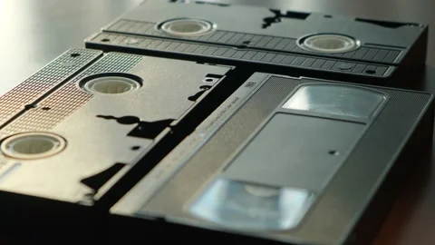 VHS cassettes lie on the table close-up view Stock Footage 196809638