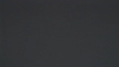 VHS defects, noise and artifacts, glitches from the old VHS tape. Gray Stock Footage 186624541