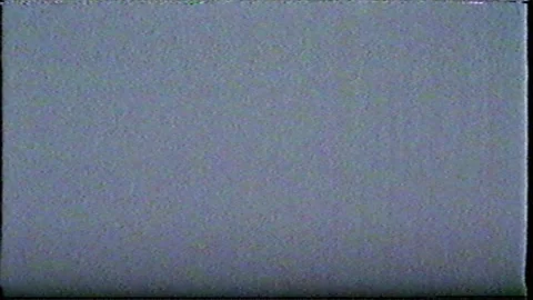 VHS effect, noise and artifacts, glitches from an old cassette. Poor signal. TV Stock Footage 244793954