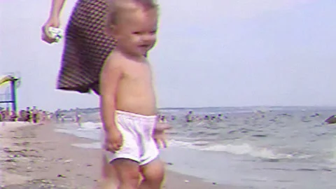 VHS little boy on sea beach Stock Footage