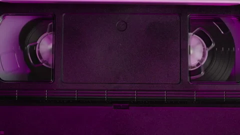 VHS PLAYER, Old video recorder inside in neon pink light close-up, VHS. Retro Stock Footage 278478079