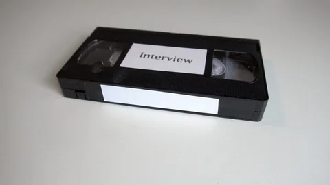 VHS Tape Labeled Interview Zoom Stock Footage 122046701