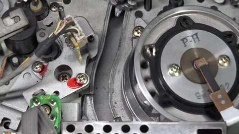 VHS tape in the player with close up on the head drum - LOAD and PLAY moveme Stock Footage 315272080