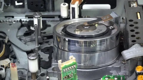 VHS tape in the player with close up on the head drum - LOAD and PLAY moveme Stock Footage 315273318