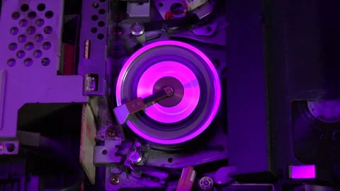 VHS tape in the player with close up on the head drum - PLAY and EJECT movem Stock Footage 315274169