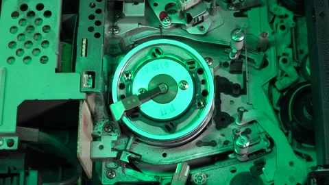 VHS tape in the player with close up on the head drum - LOAD and PLAY moveme Stock Footage 315280918