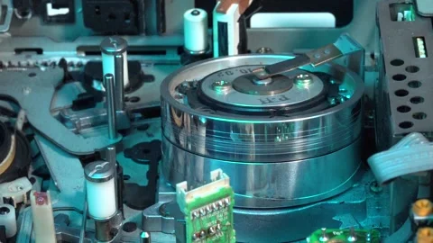 VHS tape in the player with close up on the head drum - LOAD and PLAY moveme Stock Footage 315281562