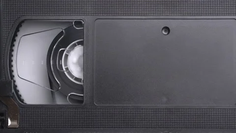 VHS video cassette inserting in the VCR, play, stop, eject, close up, copyspace Stock Footage 155712525