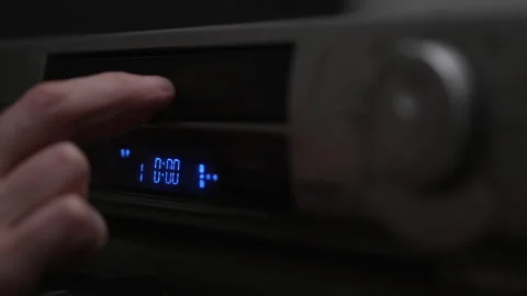Vhs videotape inserted in vcr and play Stock-Footage 337052654