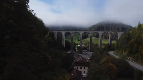 Viaduc de la Combe Maran: fantastic aerial view traveling in Swiss Viaduc Stock Footage 245505926