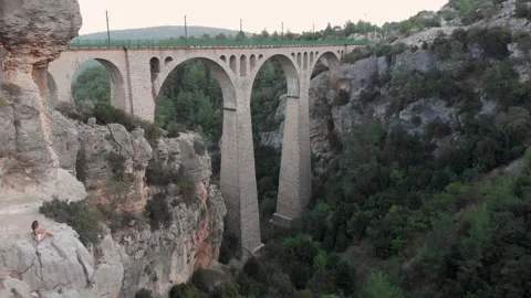 Viaduct bottom-up view from the side of the drone Stock Footage 252025403