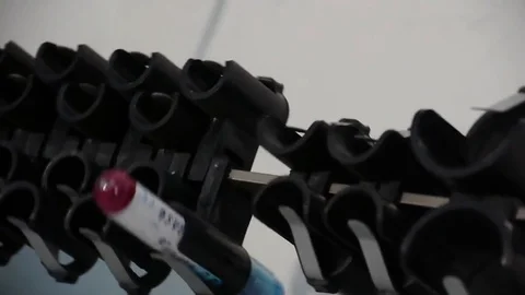 Vial of blood in a special twisting machine Stock Footage 76950908