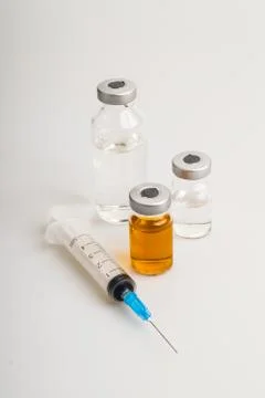 Vials and syringe Stock Photos