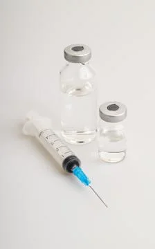 Vials and syringe Stock Photos