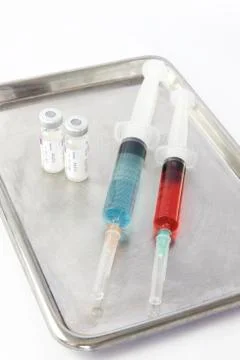 Vials and two syringe Stock Photos
