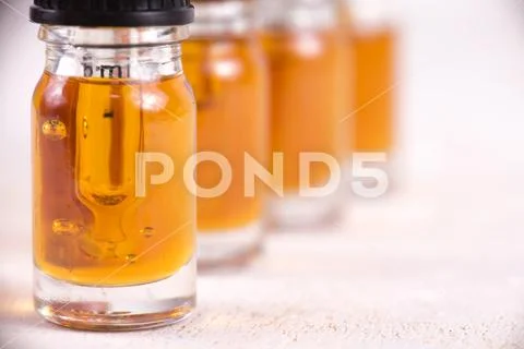 Vials of CBD oil, cannabis live resin extraction isolated on white - medical Stock Photos