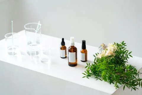Vials, glass laboratory flasks on the table. Stock Photos