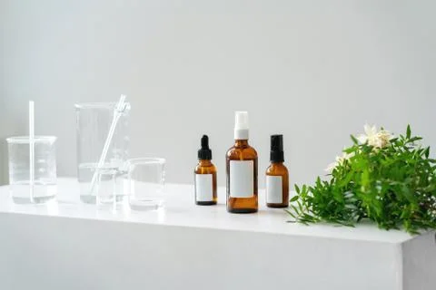 Vials, glass laboratory flasks on the table. Foto stock