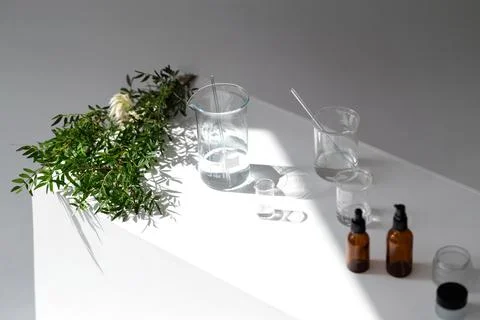 Vials, glass laboratory flasks on the table. Stock Photos