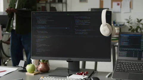 Vibe Coding Assistant Writing Script while Two Web Developers Discussing Project Stockbeeldmateriaal 335939063