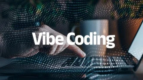 Vibe coding focuses on technology and creativity in a workspace setting Stock-Fotos
