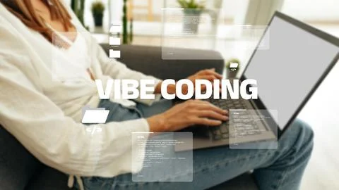 Vibe coding with laptop in a home setting during daytime Stock Photos