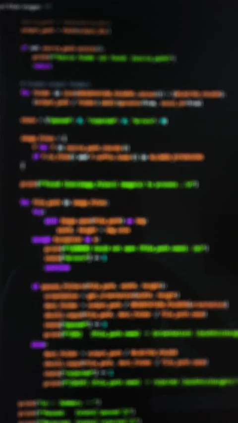 Vibe coding screen shows colorful lines of code scrolling on a dark monitor.. Stock Footage 346152330