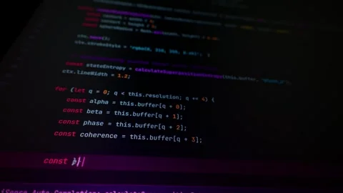 Vibe Coding Script Executing on Digital Screen in Dark Office Macro Stock Footage 347519650