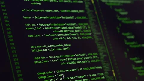 Vibe coding session with AI assistant visible on screen displaying green source Stock Footage 345653936