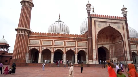 Vibrance and Devotion: The Crowd Near Jama Masjid Stock Footage 317093076