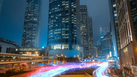 Vibrant 3D render of a modern Hong Kong cityscape at night with light trails Stock Footage 346888952