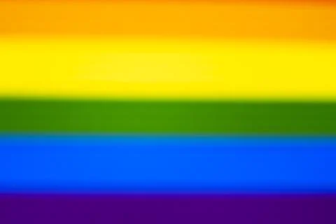 A vibrant abstract background featuring blurred horizontal stripes of rainbow Stock Illustration