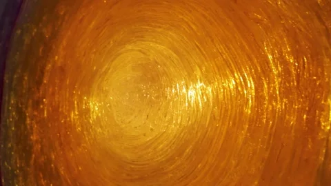 Vibrant abstract background featuring swirling golden hues and dynamic textures Stock Footage 323716391