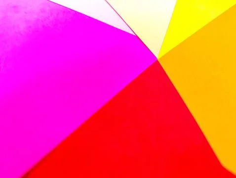 A vibrant abstract background with intersecting pink, white, and yellow pap.. Stock Photos