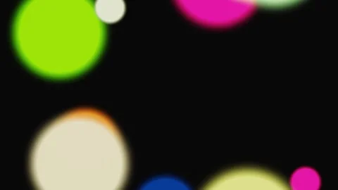 Vibrant Abstract Bokeh Light Orbs on Black Background Video stock 336961090