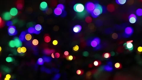 Vibrant abstract bokeh light particles in motion. Dynamic colorful defocused bac 스톡 동영상 340456626