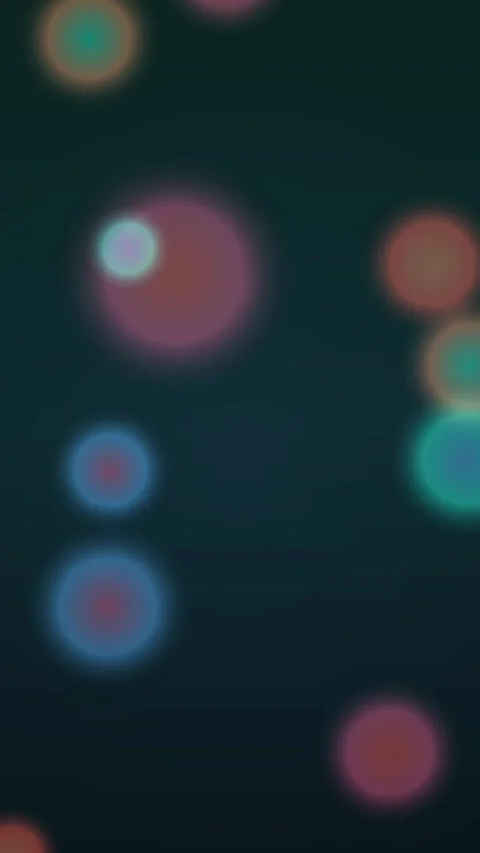 Vibrant, abstract circles float in a dark, dreamlike space Stock Footage 327941492