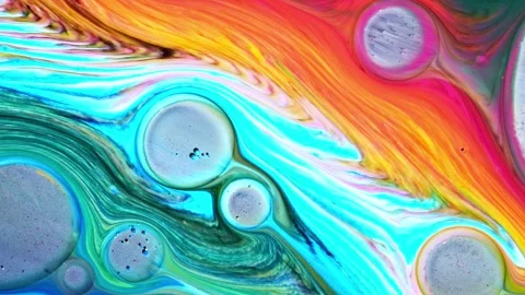 A vibrant abstract composition showcasing fluid dynamics with bubbles creating a Stock Footage 303608042
