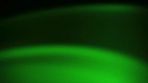 Vibrant abstract gradient featuring rich green and dark tones with a grainy.. Stock Photos