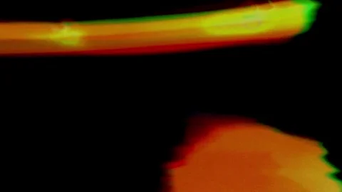 Vibrant abstract light streaks blend across a deep black expanse, creating Stockbeeldmateriaal 318610710
