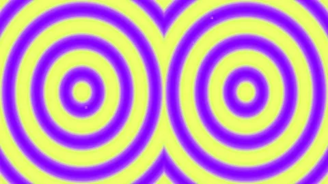 Vibrant abstract retro pattern of hypnotic green and purple concentric circle Stock Footage 336506425