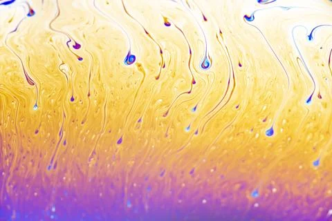 Vibrant abstract soap bubble surface with swirling colors and iridescent pa.. 스톡 사진